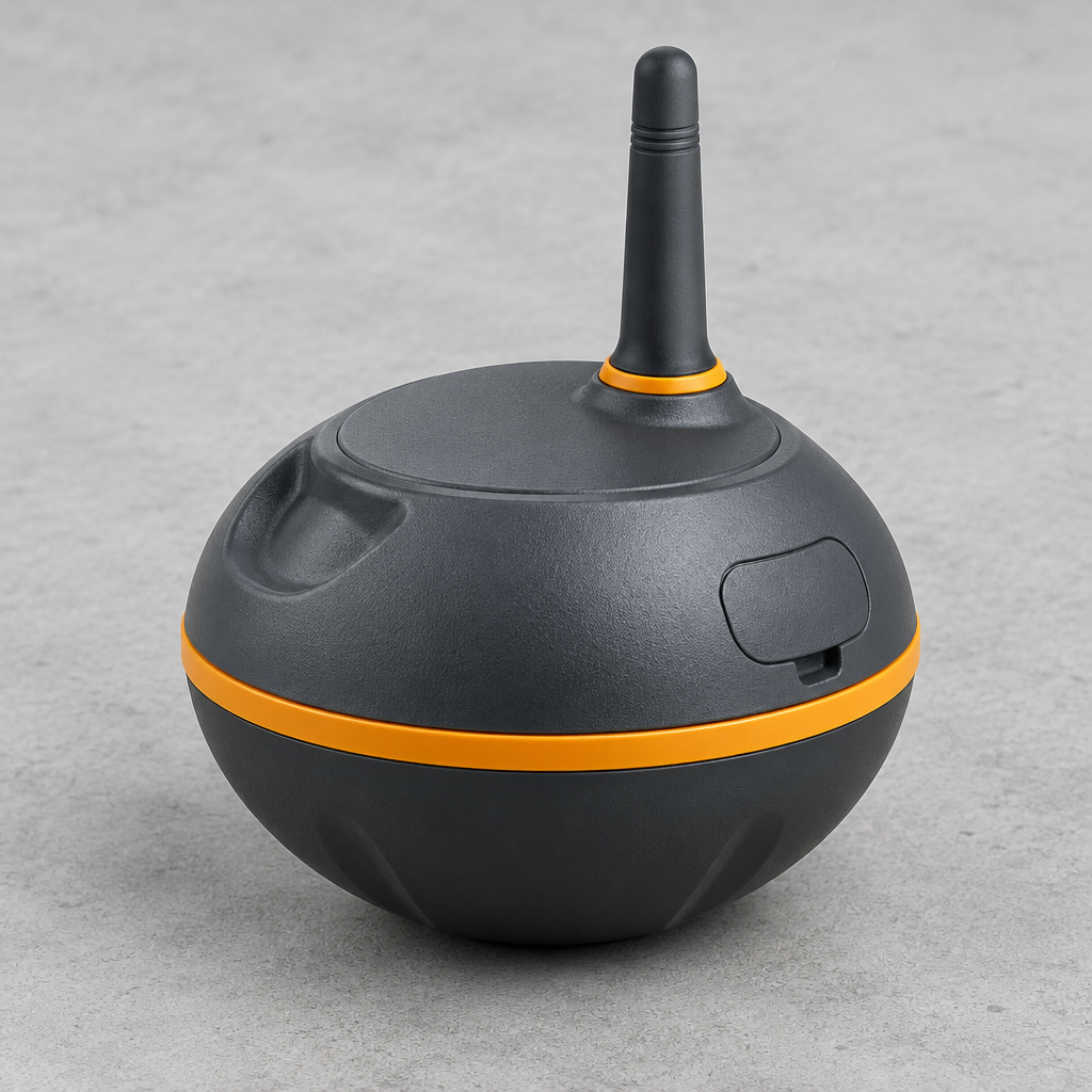A spherical black electronic device with a vertical antenna, featuring a bright orange accent ring and a matching orange horizontal band, set against a neutral gray background.