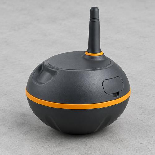 A spherical black electronic device with a vertical antenna, featuring a bright orange accent ring and a matching orange horizontal band, set against a neutral gray background.